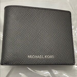 Michael Kors Textured dark gray black wallet.